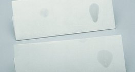 Петно от вода и петно от глицерин върху филтърна хартия