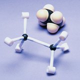 Space-filling and stick model of the ethane molecule with the lowest energy conformation